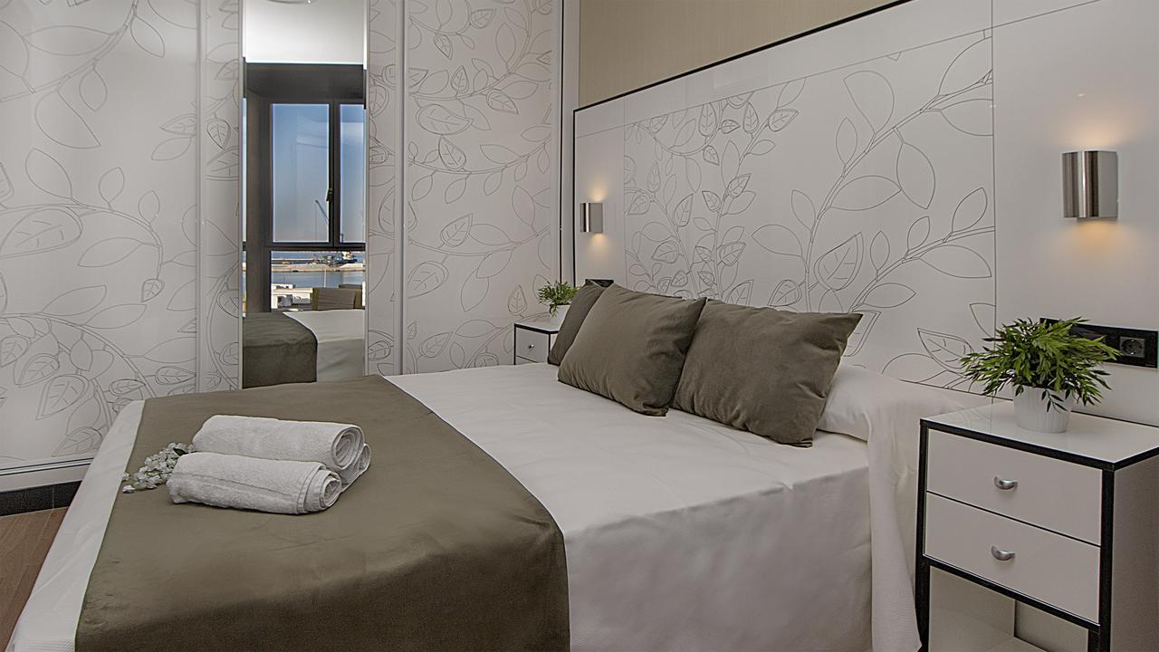 מאלגה Apartamentos Suites Oficentro Deluxe מראה חיצוני תמונה